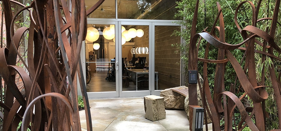 new courtyard looking in thru gate 02